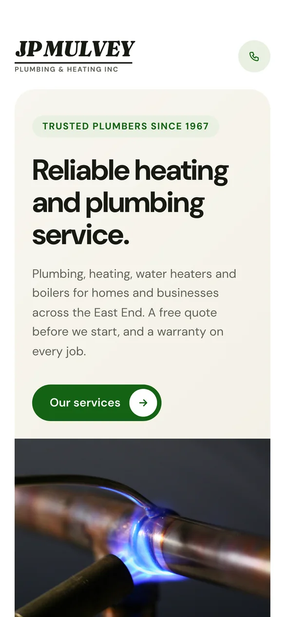 The JP Mulvey Plumbing and Heating concept site on a phone.